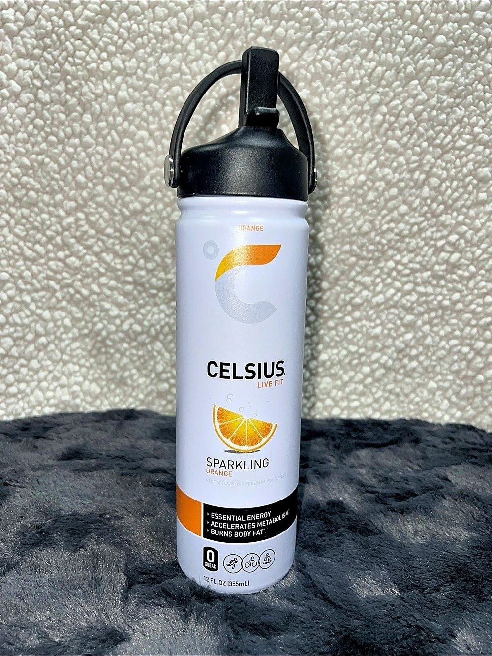 Celsius Live Fit Sparkling Orange Branded 24oz Insulated Bottle.